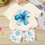 SHEIN 2pcs/Set Toddler Girls' Casual Hibiscus Flower, Marine Life, Shell, Bow Print Loose Round Neck Short Sleeve T-Shirt And Fitted Bike Shorts Set, Suitable For Spring/Summer, Casual, Beach, Weekend, Cute Summer Outfit For Young Girl, Korean Style, Summer Outerwear, Young Girl Summer Clothes, Young Girl Shell Set, Young Girl Beach Set