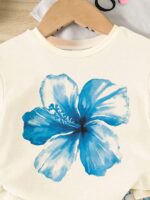SHEIN 2pcs/Set Toddler Girls' Casual Hibiscus Flower, Marine Life, Shell, Bow Print Loose Round Neck Short Sleeve T-Shirt And Fitted Bike Shorts Set, Suitable For Spring/Summer, Casual, Beach, Weekend, Cute Summer Outfit For Young Girl, Korean Style, Summer Outerwear, Young Girl Summer Clothes, Young Girl Shell Set, Young Girl Beach Set - Image 4