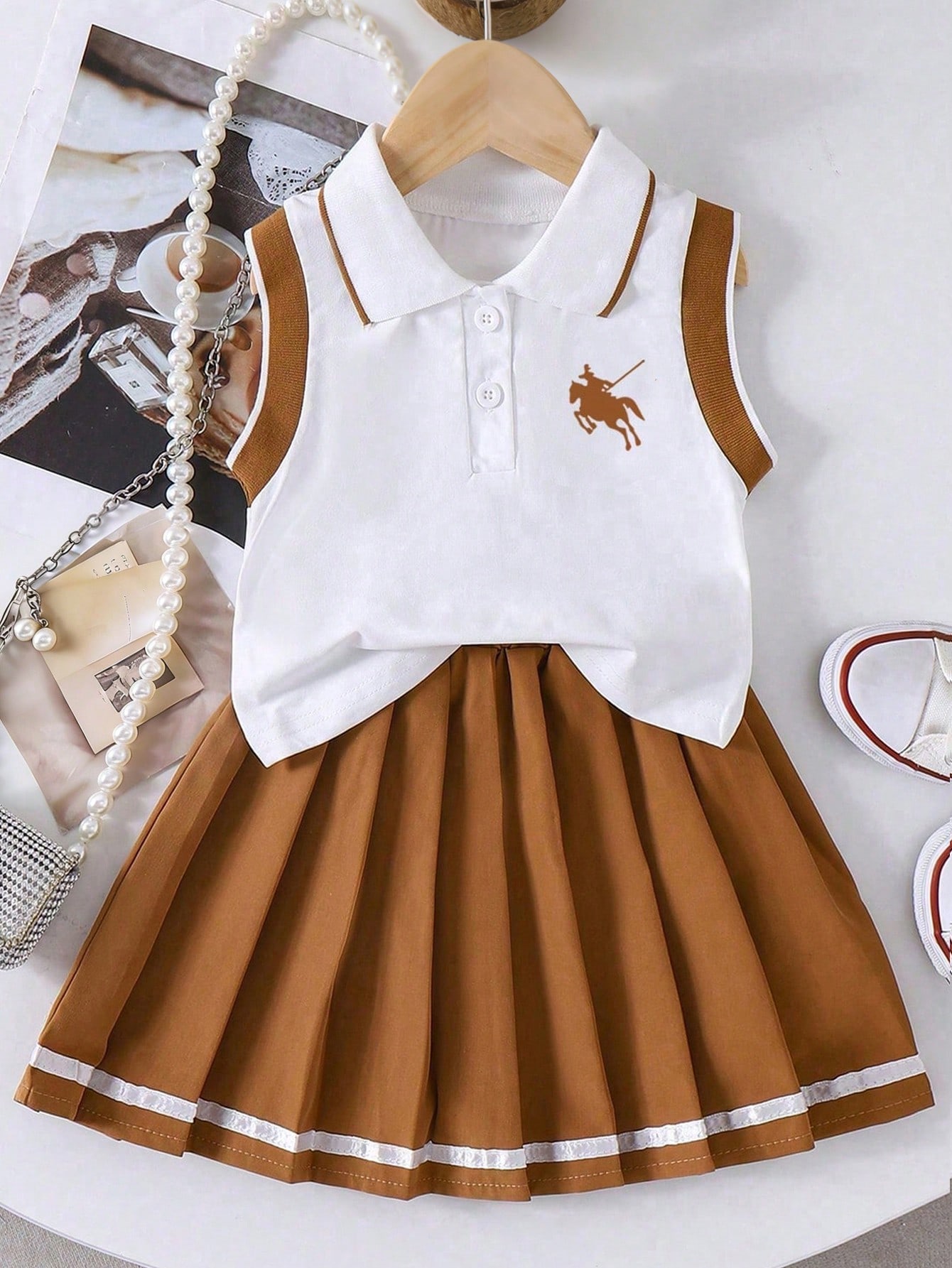 http___img.ltwebstatic.com_v4_j_spmp_2026_01_06_a0_17676887084a3fc3764b7f795f00d8ec0a7989a972 Tween Girl Knight Print Polo Collar Tank Top And Pleated Mini Skirt Casual Outfit - Image 1